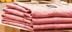 Folded pink garments,  at Marza Hypermarket