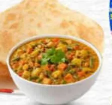 2pcs Poori + Veg Curry, QAR 4.00 at Marza Hypermarket